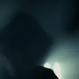 Dark live set silhouette with drummer at 0:15