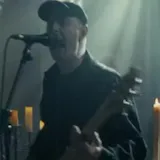 Candlelit live band performance clip at 0:24