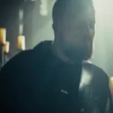 Candlelit live band performance clip at 0:08