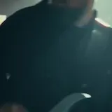 Candlelit live band performance clip at 0:16