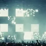 Crowd and stage lights at live show at 0:22