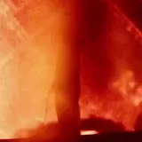 Madeon live stage lights and silhouette performance at 0:14
