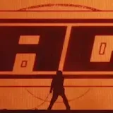 Madeon live stage lights and silhouette performance at 0:07