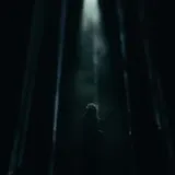 Dark wide shots of Madeon's live stage and crowd at 0:05