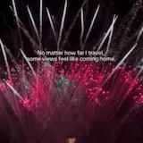 Pink fireworks over dark parking lot at 0:01