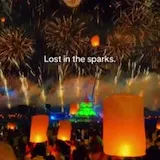 Fireworks and lanterns over night festival at 0:01