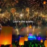 Fireworks and lanterns over night festival at 0:07