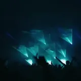 DJ plays live set under laser light show at 0:01