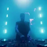 DJ plays live set under laser light show at 1:22