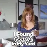 Woman shows Permian era fossils from yard at 0:01