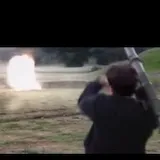Music video shots of band and film set explosion at 0:06