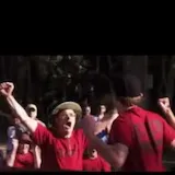 Music video shots of band and film set explosion at 0:01