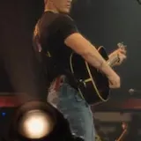 Parker McCollum live singing with guitar at 0:19