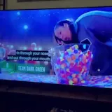 Phone recording of 99 to Beat TV segment at 0:02
