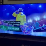 Phone recording of 99 to Beat TV segment at 0:05