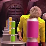 Elijah stacks cans in Column of Cans challenge at 0:01