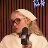 Grimes turned years of fear, anger & public scrutiny into Psy Opera at 0:55