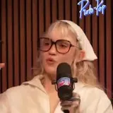 Grimes turned years of fear, anger & public scrutiny into Psy Opera at 1:23