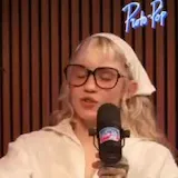 Grimes turned years of fear, anger & public scrutiny into Psy Opera at 0:01
