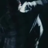 Live band guitar and mosh pit shots at 0:09