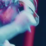 Band performing live on a concert stage at 0:21