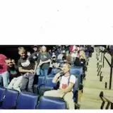 Live concert crowd and band onstage with title card at 0:01