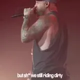 Brantley Gilbert sings live on stage at 0:10