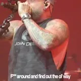 Brantley Gilbert sings live on stage at 0:20