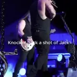 Live concert performance with lyric captions at 0:01