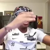 Streamer reacts with shock in gaming chair at 0:08