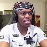 Streamer reacts with shock in gaming chair at 0:04
