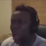 KSI reacts on webcam with friend behind at 0:17
