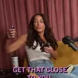 Woman shows tasers and self-defense gadgets on podcast at 0:32