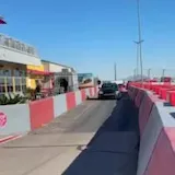 Exotic cars pass on Speed Vegas lane at 0:01