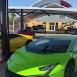 Green Lamborghini parked at Speed Vegas at 0:02