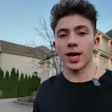 17-year-old shows off two luxury cars at home at 0:01