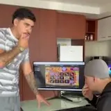 A man answers a National Park Exclusion Register call while his friend at 0:01