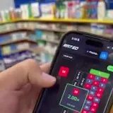 A man buys snacks and shows a Razed win on his phone as his friend says at 0:11