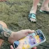 A man counts off his five island survival essentials, from a chainsaw at 0:36