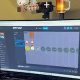 A man moves from his kitchen to his bed and bathroom as app icons stack at 0:18