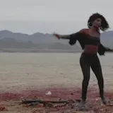A rapper spits boastful verses over a beat in the CATWOMAN Swamp at 1:51