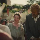 A resident fisherwoman and her husband bless a newlywed couple at their at 0:08