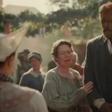 A resident fisherwoman and her husband bless a newlywed couple at their at 0:04
