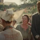 A resident fisherwoman and her husband bless a newlywed couple at their at 0:01